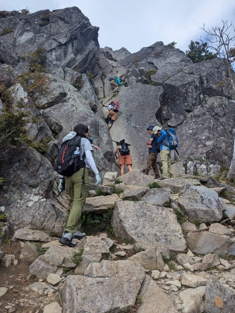 The final climb with a chain up Mt. Kentoku.